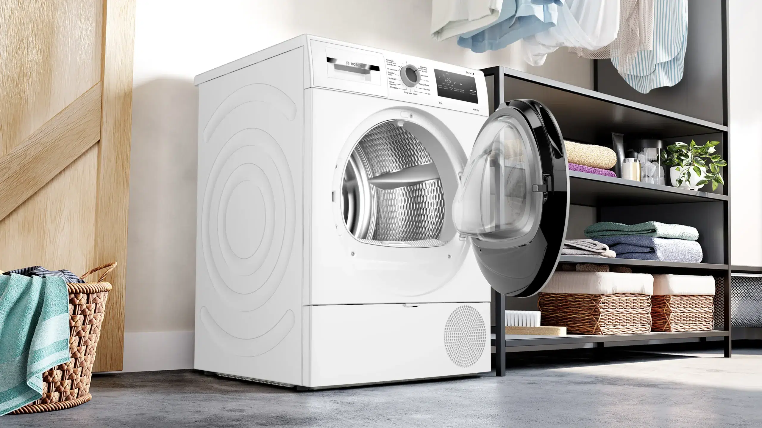 Bosch WTH8529EPL עם דלת פתוחה בחדר כביסה